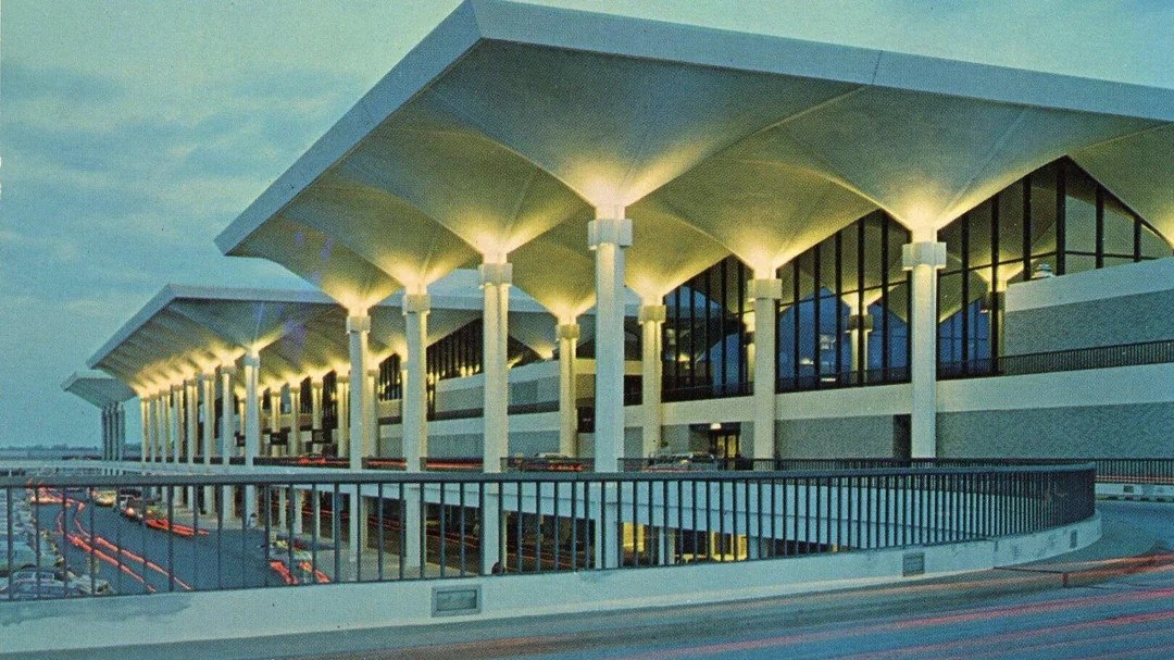 Memphis International Airport terminal canopy lit at dusk